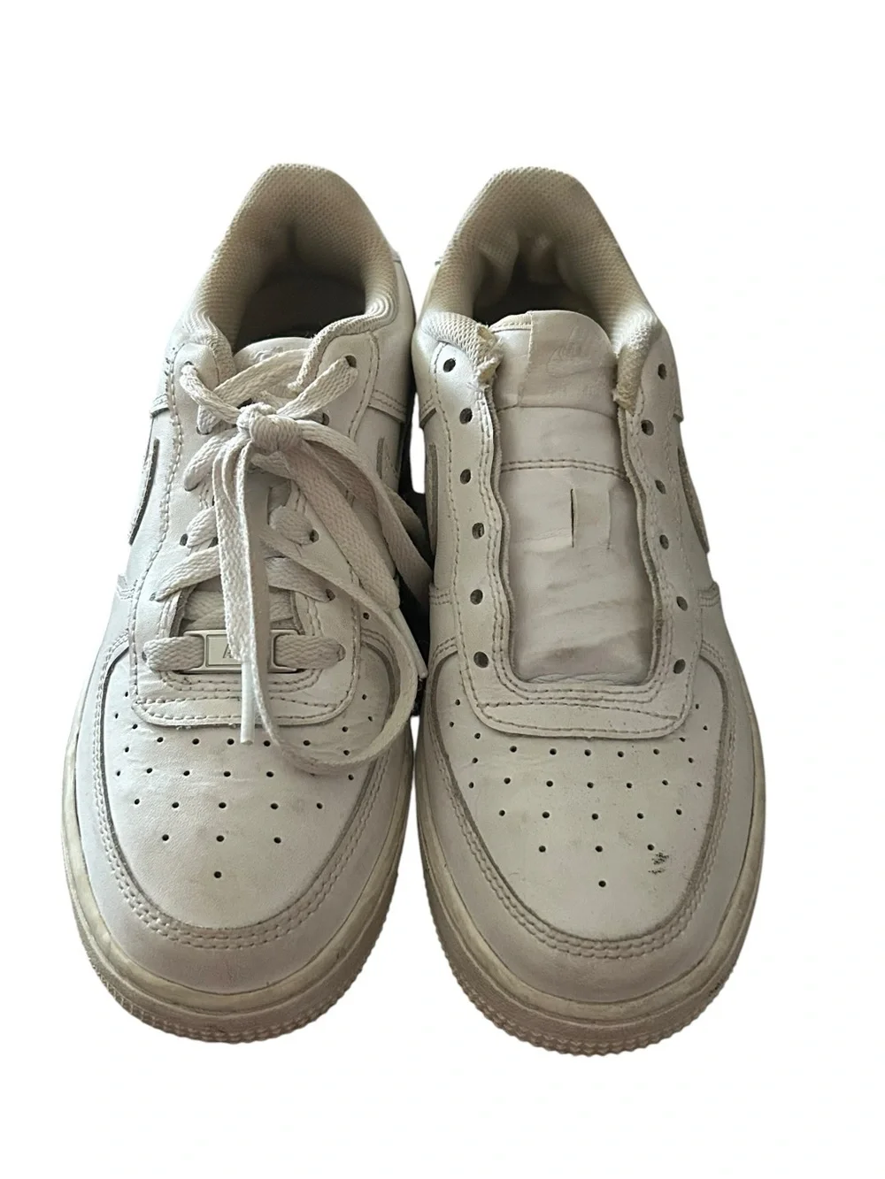 Nike Kids White Low-Top Sneakers with Subtle Off-White Tones